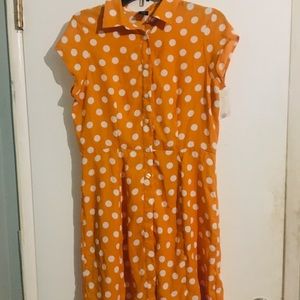 50’s style yellow dress with white polka dots